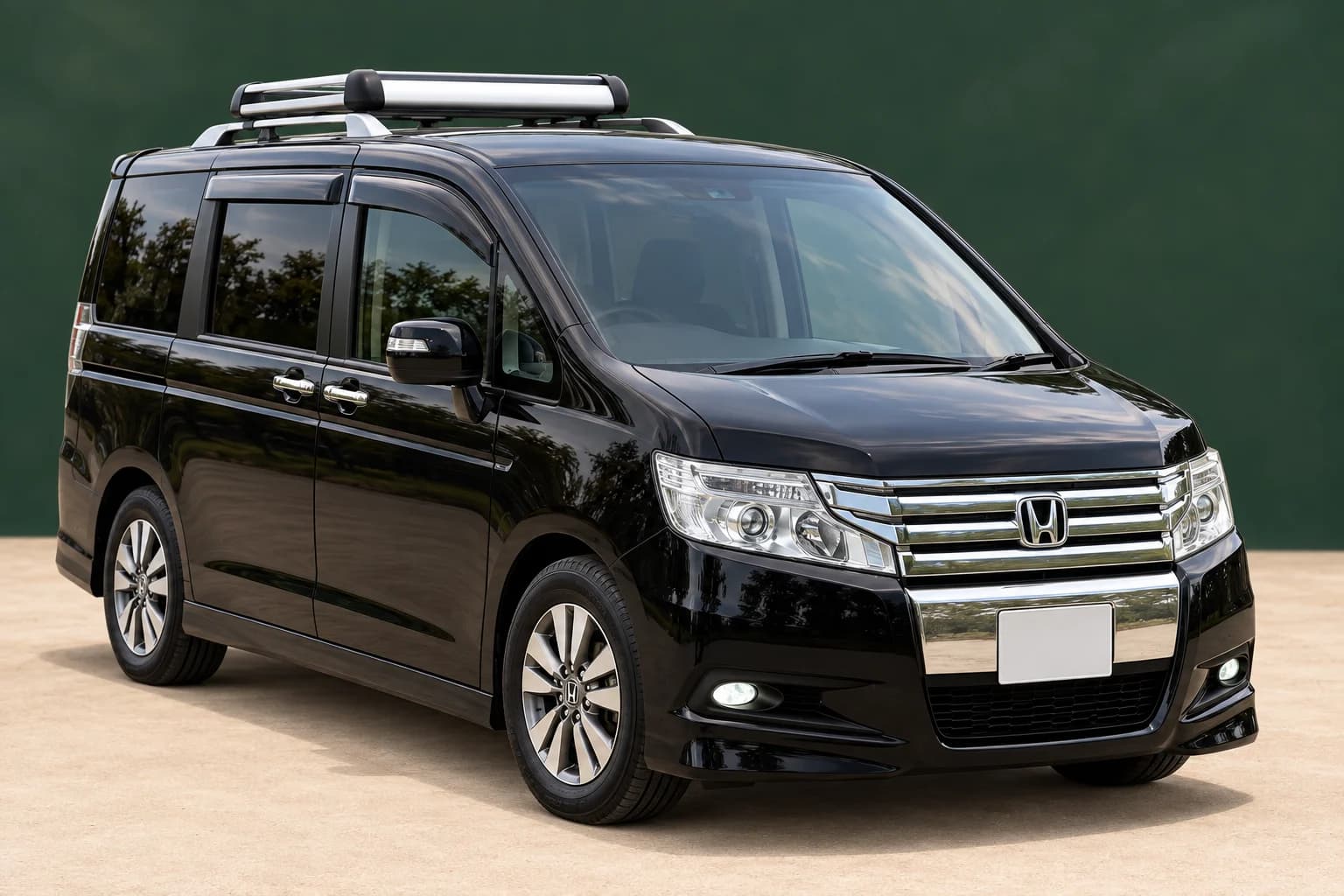 Black Honda Stepwagon Spada seven-seater with roof crossbars for hire in Nairobi
